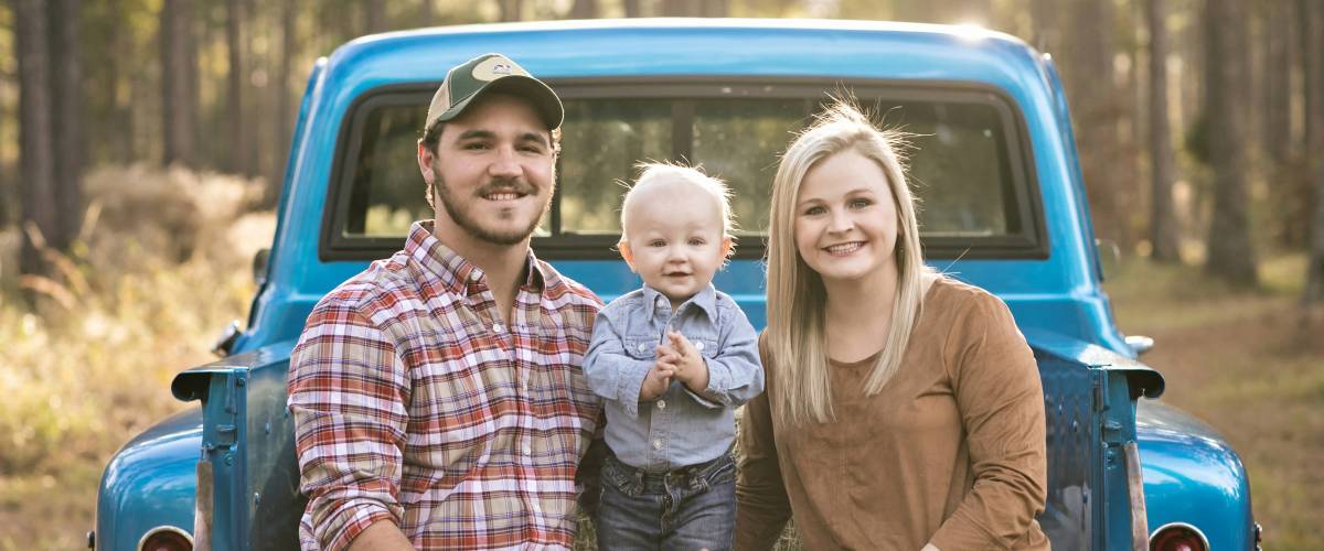 Family sitting in truck