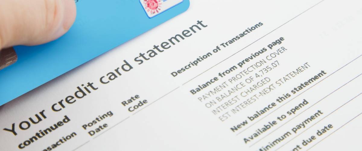 A Credit Card on top of a fake Bank Statements