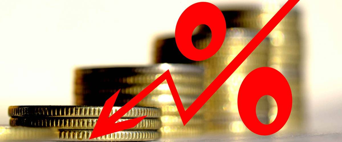 Red icon of interest on the background of coins