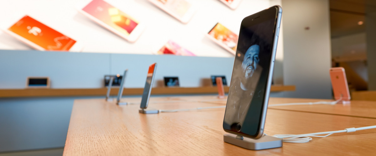 Apple iPhone on display in an Apple store quality electronics smart phone