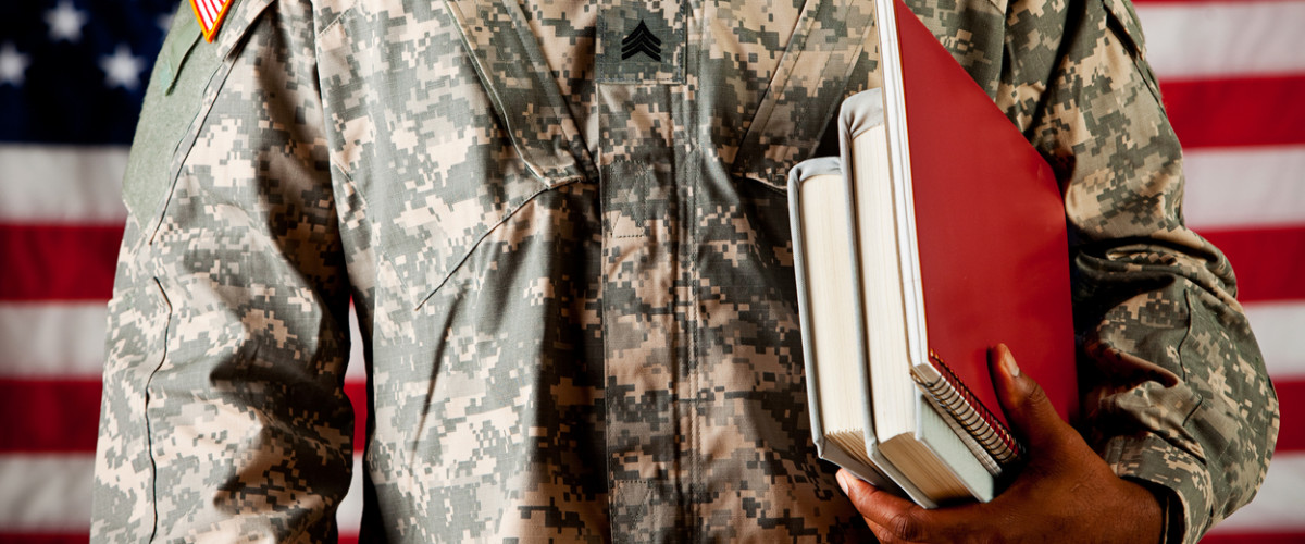 US Army soldier studying books