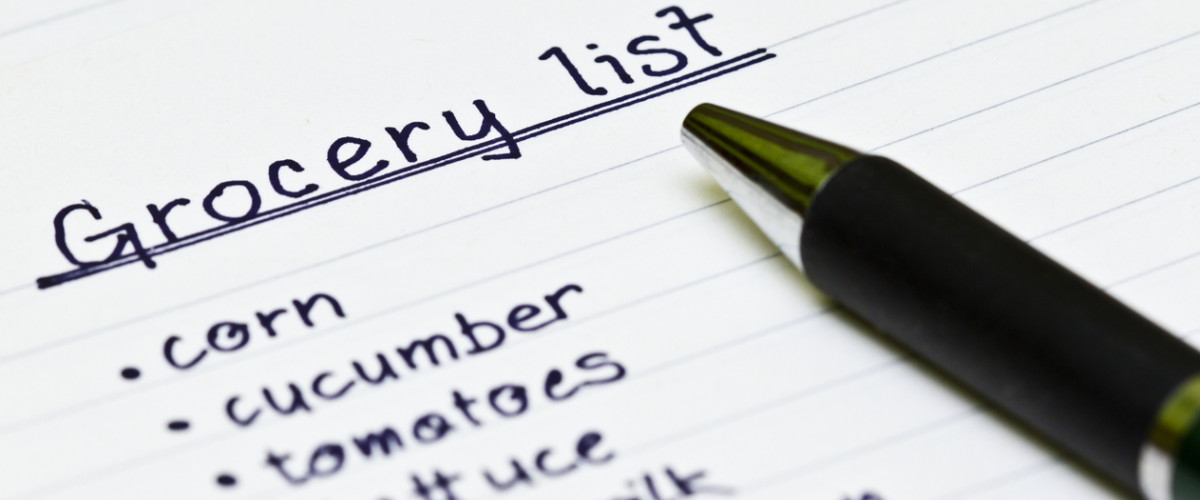 Grocery shopping list with a ball point pen