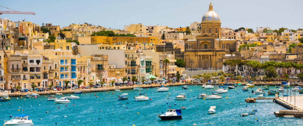 Many little yachts and boats from plan wiev to the bay near Valletta in Malta