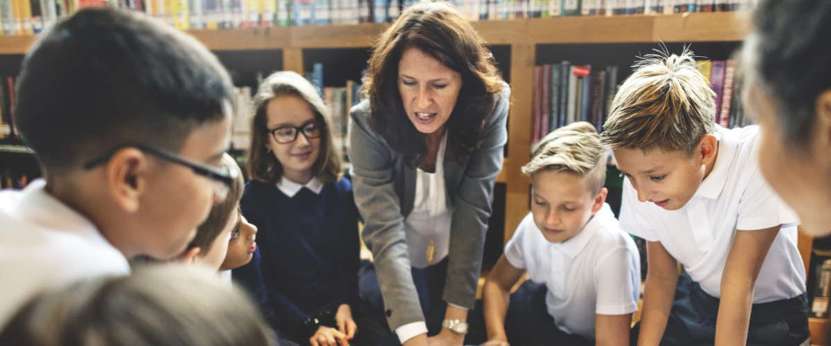 Teacher school teaching students lesson diverse class