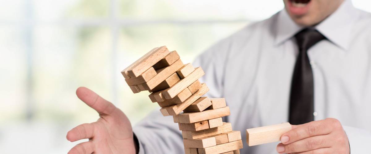 Businessman Fails Building Tower, Concept For Challenge And Fail In Business