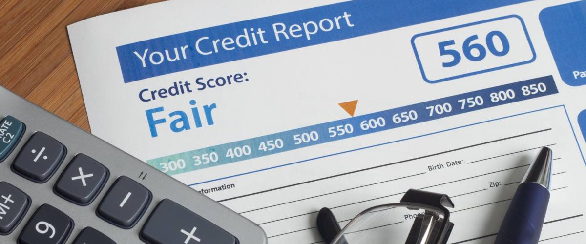 Credit report with score on a desk