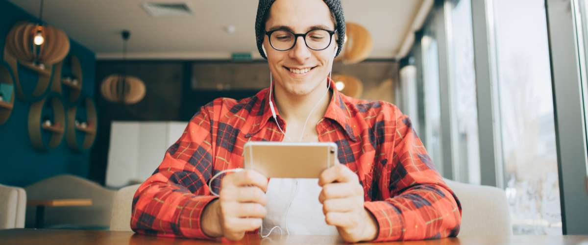 young man watching a video on his mobile phone