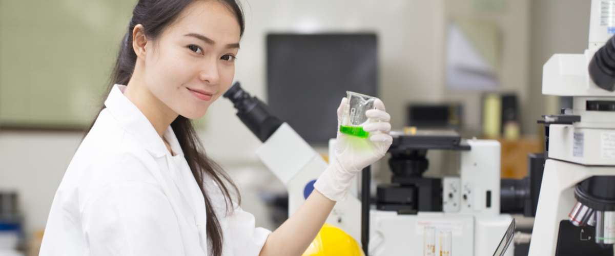 Scientist doing chemical test in laboratory