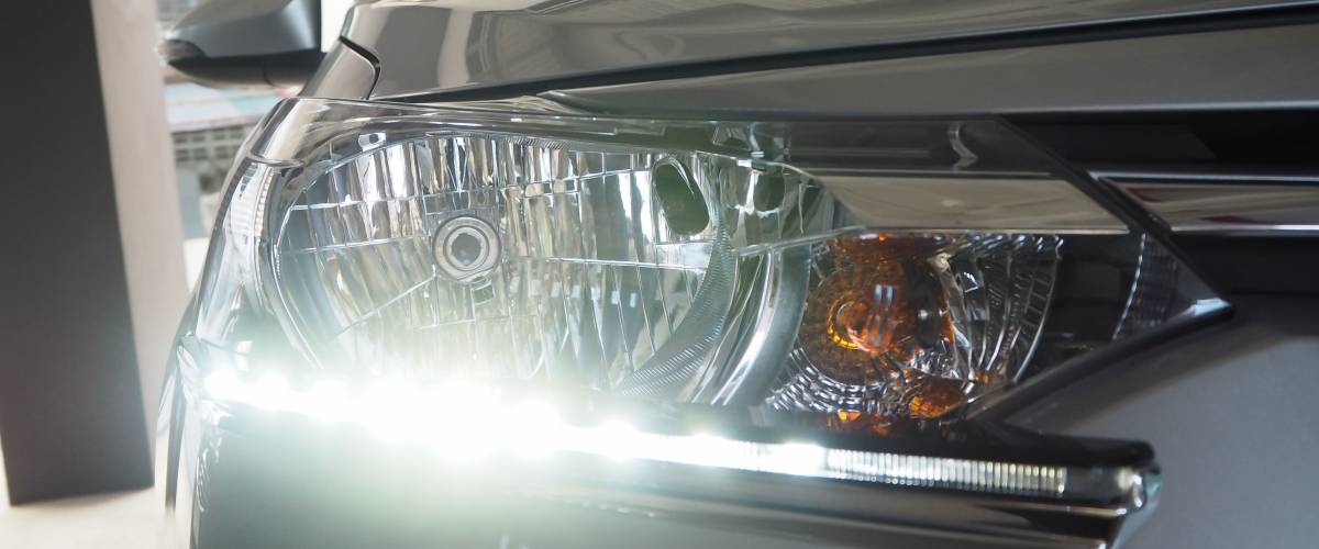 Daytime Running Light. Headlight LED daytime light for car. Lighting standards for cars and safety of motorists.