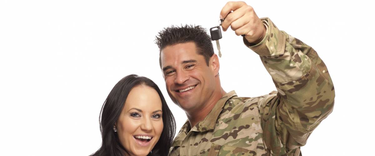 Soldier with his wife holding new car key