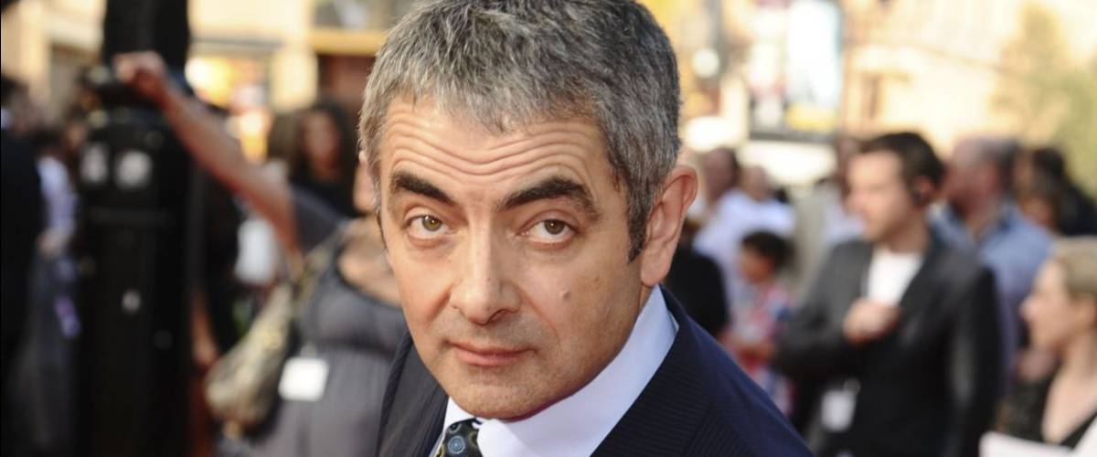Rowan Atkinson arrives for the