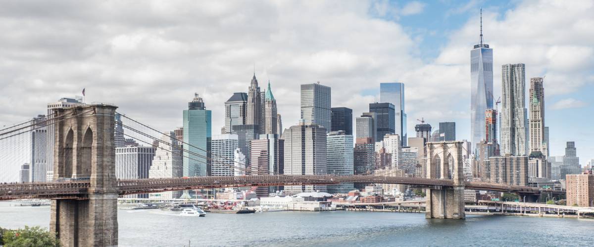 View of Brooklyn Bridge and Manhattan skyline - New York City downtown, photographed from Manhattan Bridge