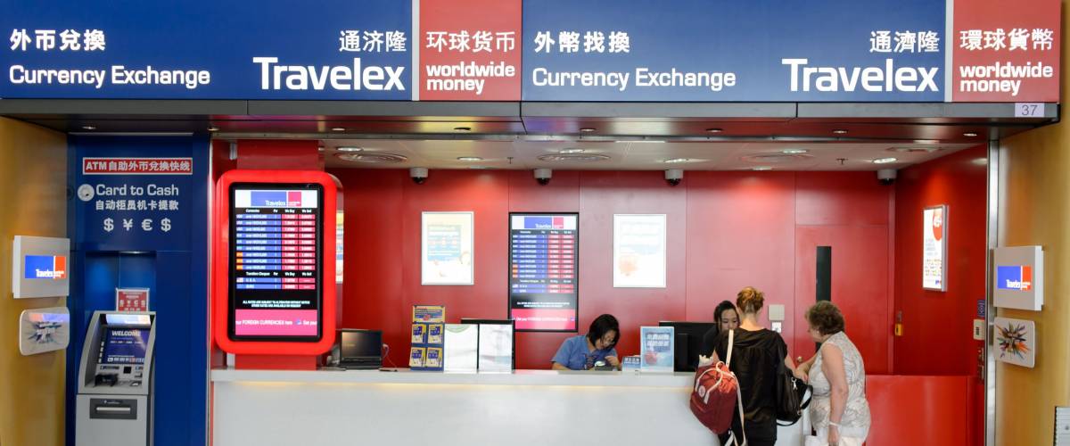 HONG KONG - JUNE 04, 2015: Travelex in Hong Kong Airport. Travelex Group is a foreign exchange company founded by Lloyd Dorfman and headquartered in London