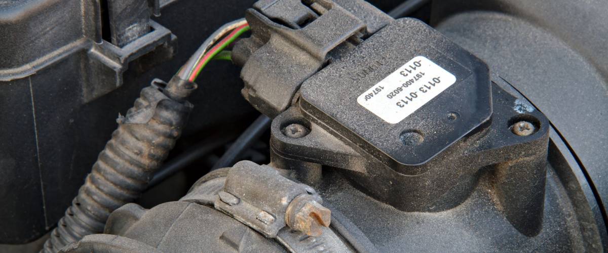 Mass air flow sensor of a car at the air filter housing.