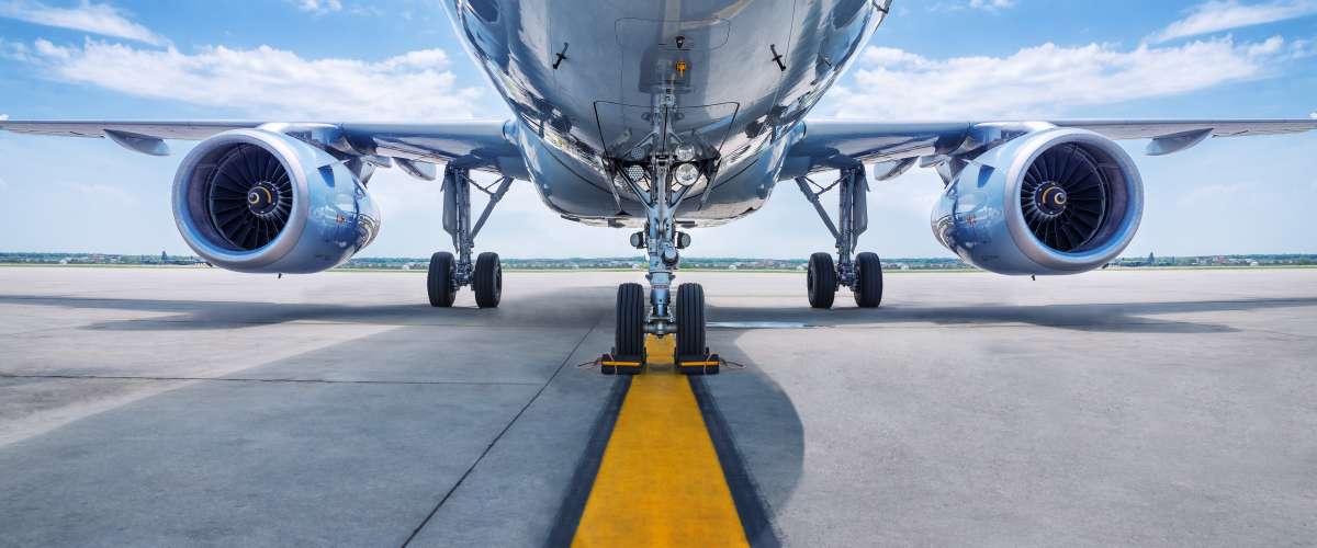 airplane underbelly from the tarmac