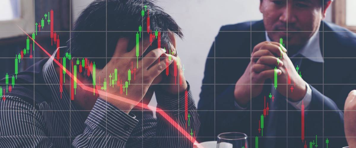 Team businessman with chart in the fall. economy or stock market going down.