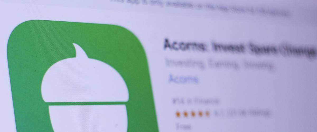 JEMBER, EAST JAVA, INDONESIA, MAY 31, 2018. Acorns - Invest Spare Change app in App Store. Close-up on the laptop screen.