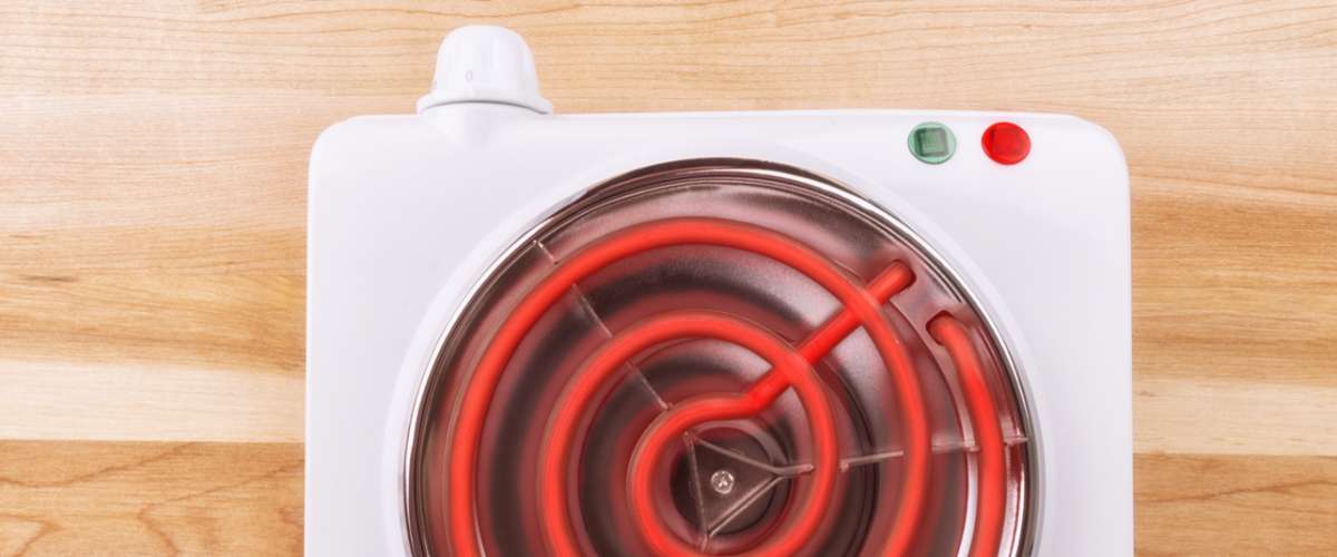 Electric portable stove on a heating element