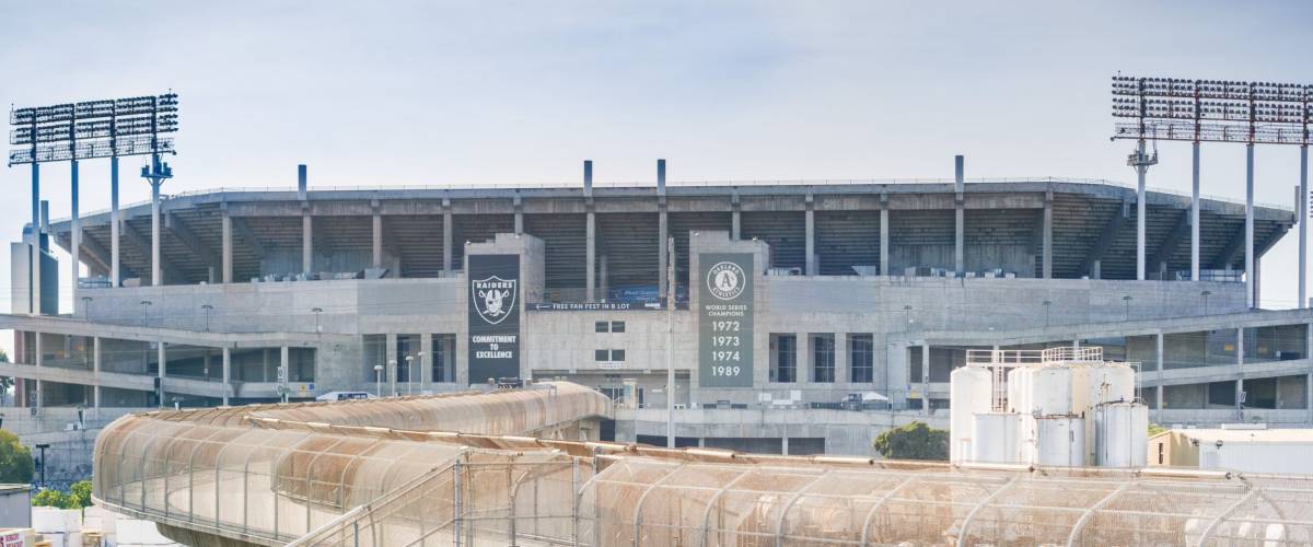 November 19, 2017 Oakland/CA/USA - Pedestrian bridge connecting the BART stop and Oakland–Alameda County Coliseum complex, a multi purpose stadium, San Francisco bay area
