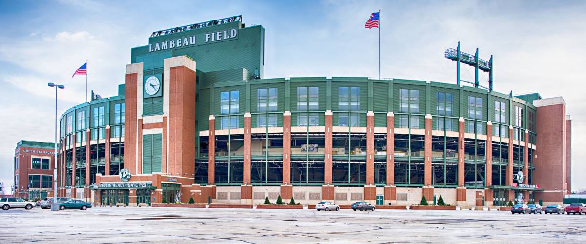 Green Bay, Wisconsin - December 2, 2014: Lambeau Field home of the Green Bay Packers with an empty parking lot except for visitors.