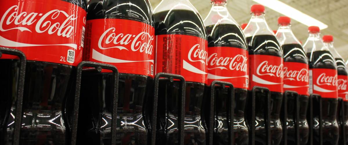 TORONTO, CANADA - OCTOBER 31, 2014: Coca Cola products on display in a grocery store. Coca Cola Company is leading manufacturer of soda drinks in the world.