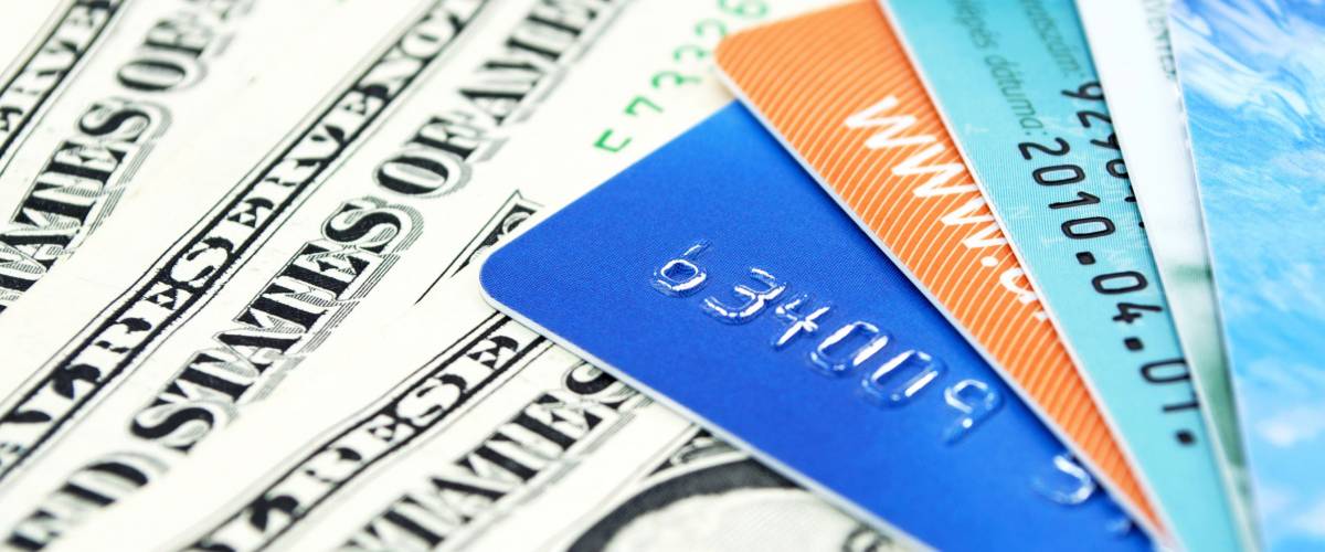 Credit cards and dollar bills