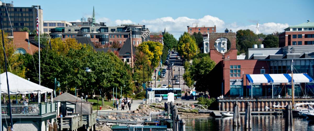 Burlington, VT, USA - September 30, 2013: People gather to watch the boats along the water at the Burlington Marina.