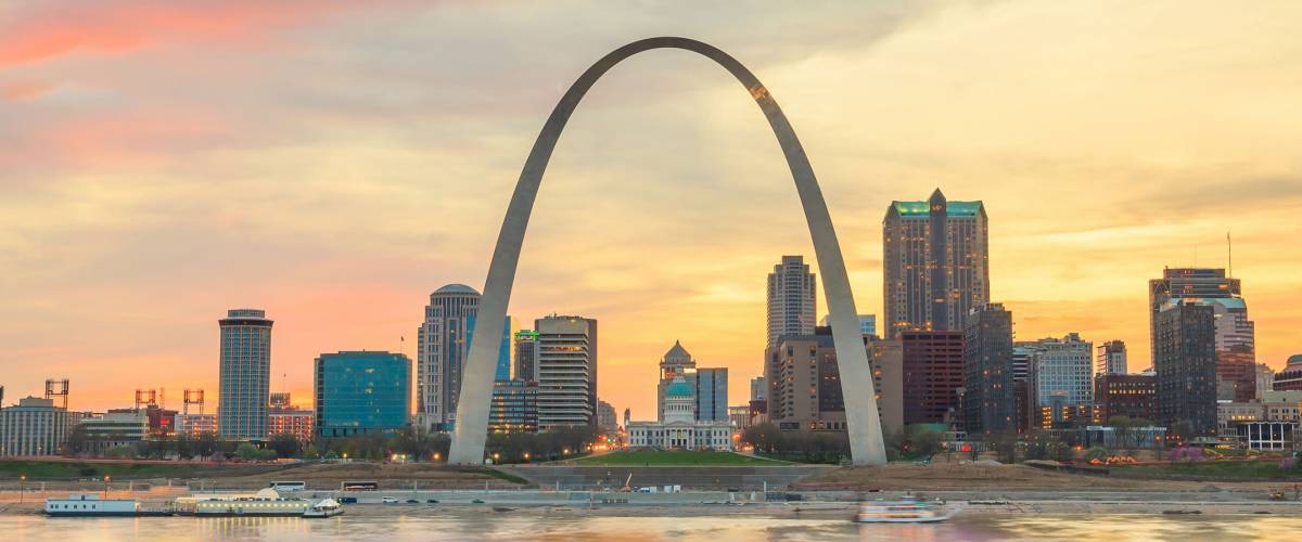 City of St. Louis skyline. Image of St. Louis downtown at twilight.