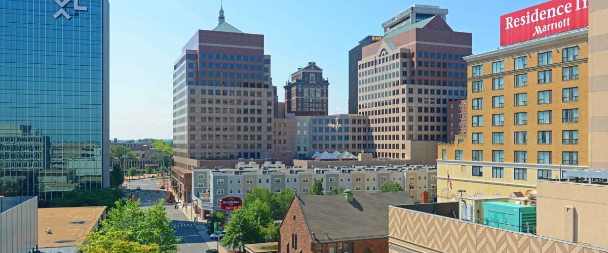 HARTFORD, CT, USA - AUG. 16, 2015: Hartford modern city skyline on Market Street in downtown Hartford, Connecticut, USA.