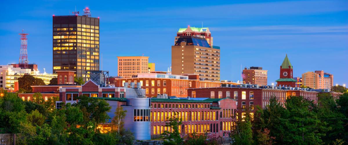 Manchester, New Hampshire, USA Skyline on the Merrimack River.