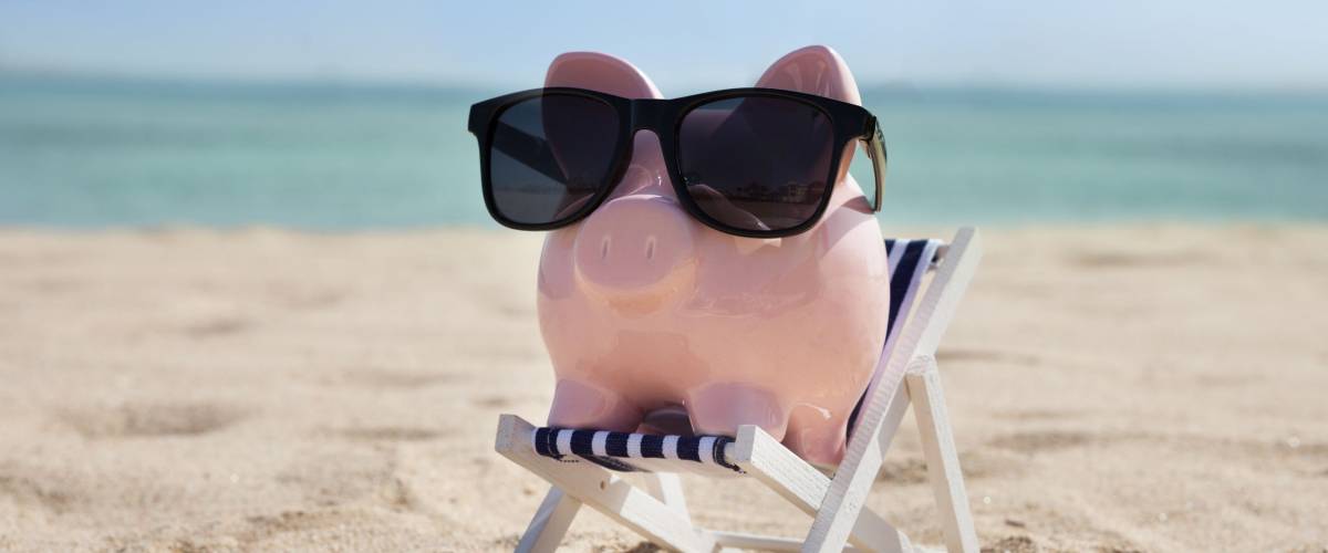 Piggy Bank On Deckchair With Sunglasses