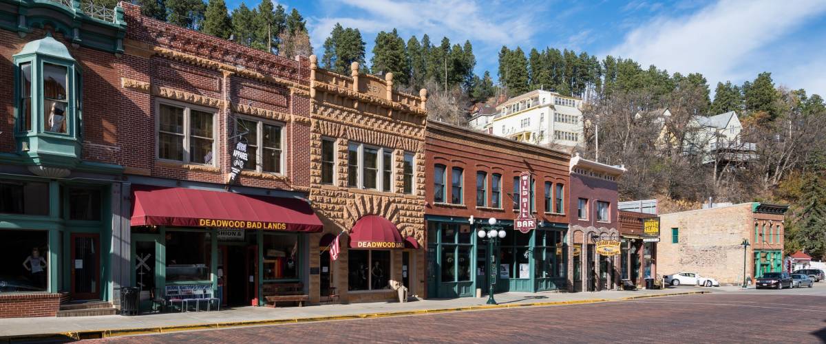 Deadwood, SD. South Dakota collects collects taxes on cigarettes, alcohol and business licenses