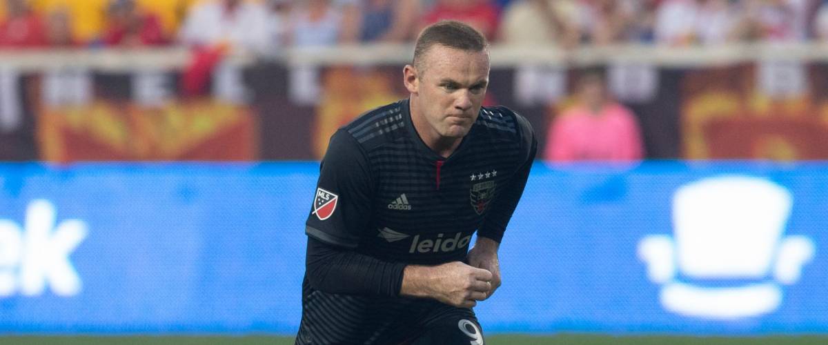 Harrison, NJ - August 26, 2018: Wayne Rooney (9) of D.C. United performs free kick during regular MLS game against Red Bulls at Red Bull Arena Red Bulls won 1 - 0