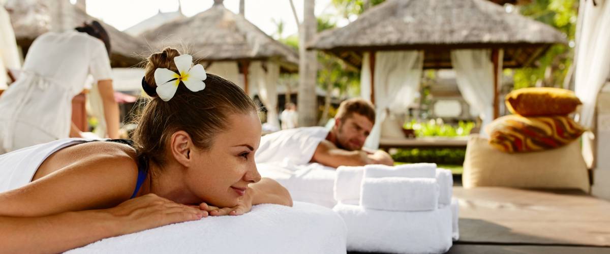 Romantic Couple Spa. Closeup Of Beautiful Healthy Happy Smiling Woman, Handsome Man Relaxing At Day Spa Resort.