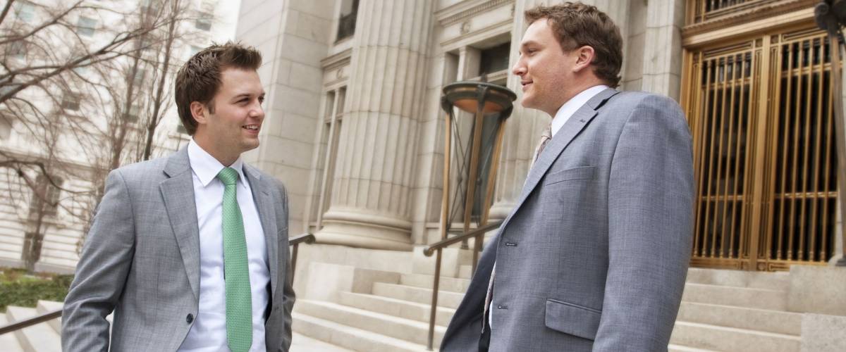 Smiling Confident Businessmen or Lawyers