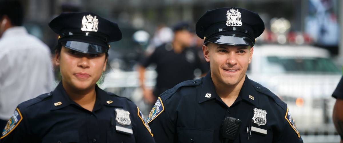 NEW YORK, USA - Sep 21, 2017: Police officers performing his duties on the streets of Manhattan, New York City