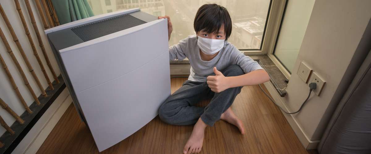Air filter boy inside on a polluted day