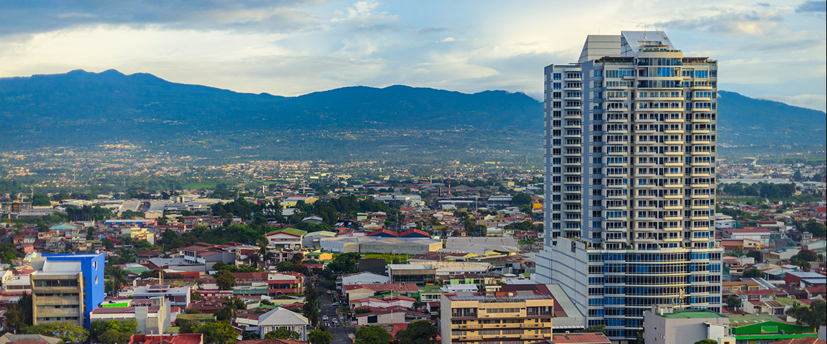 San Jose Costa rica capital city street view with mountains in the back