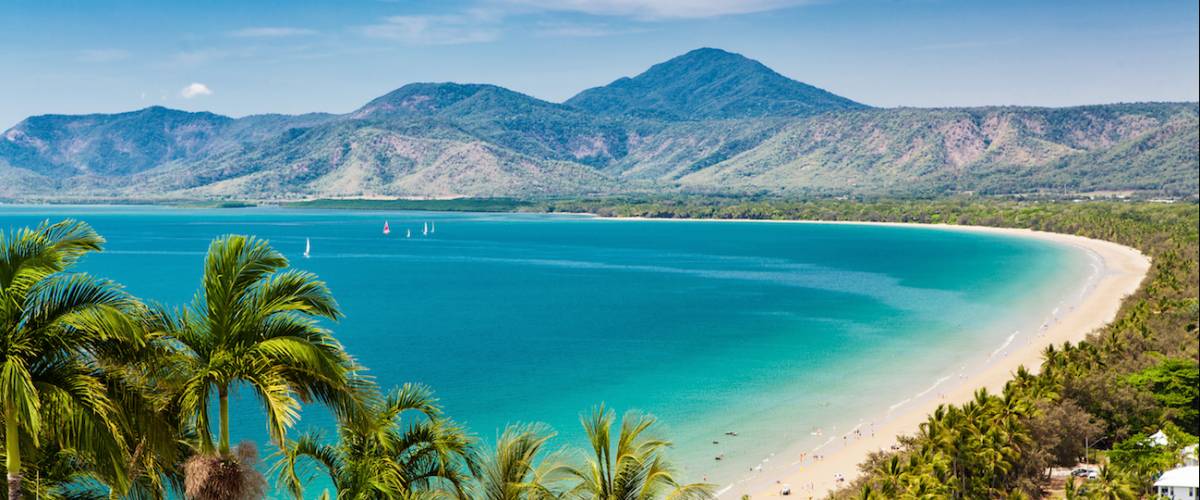 Port Douglas beach and ocean on sunny day, Queensland, Australia.