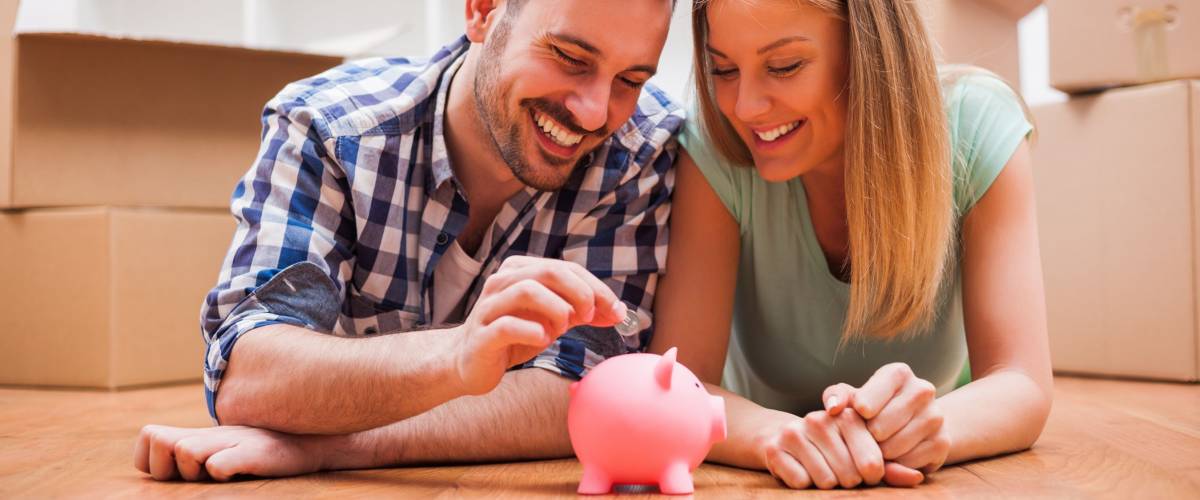 Young couple is saving money in their new home