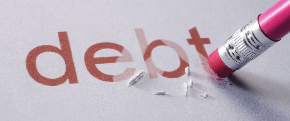 pencil erasing the word-debt