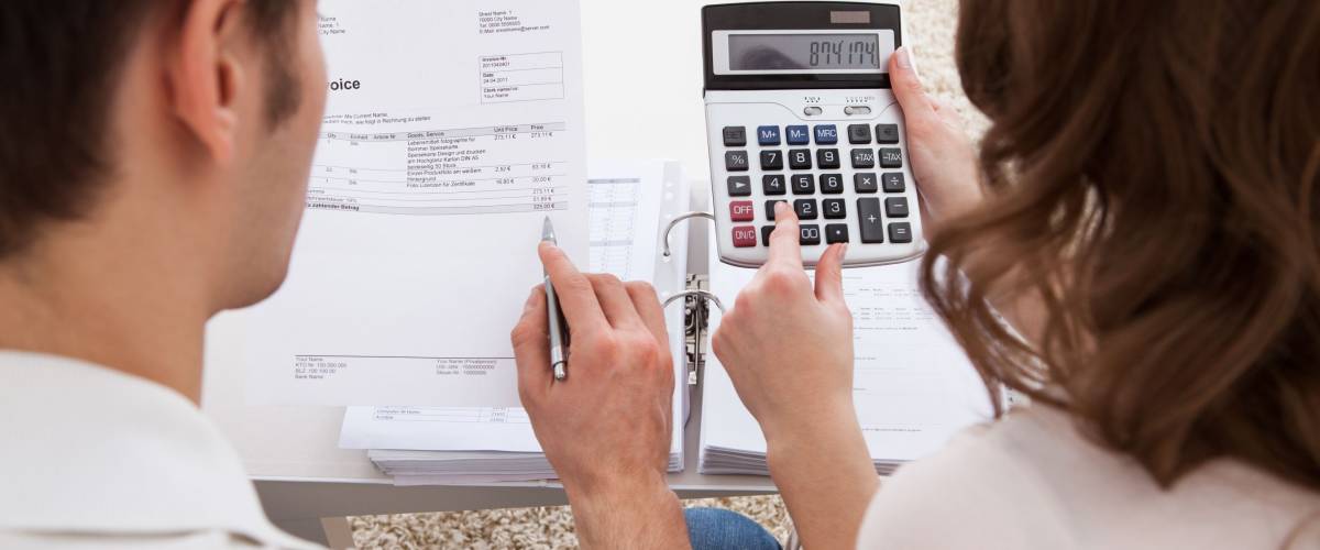 People calculating their budget, figuring out the best allocation for their assets.