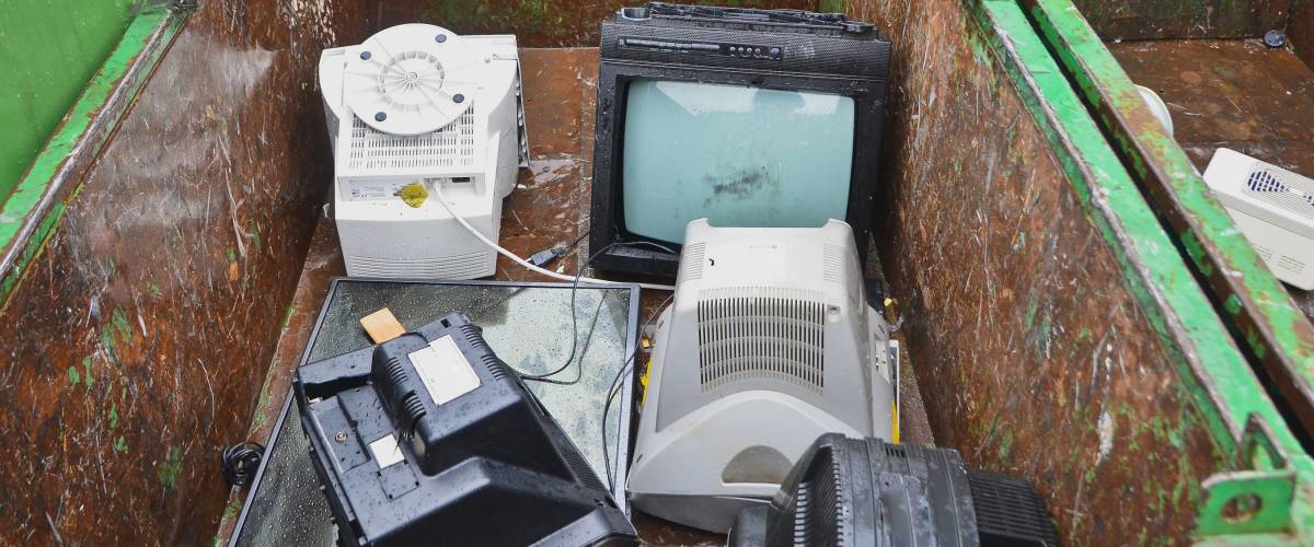 Used tv sets and monitors, other electronic appliances at recycling center.