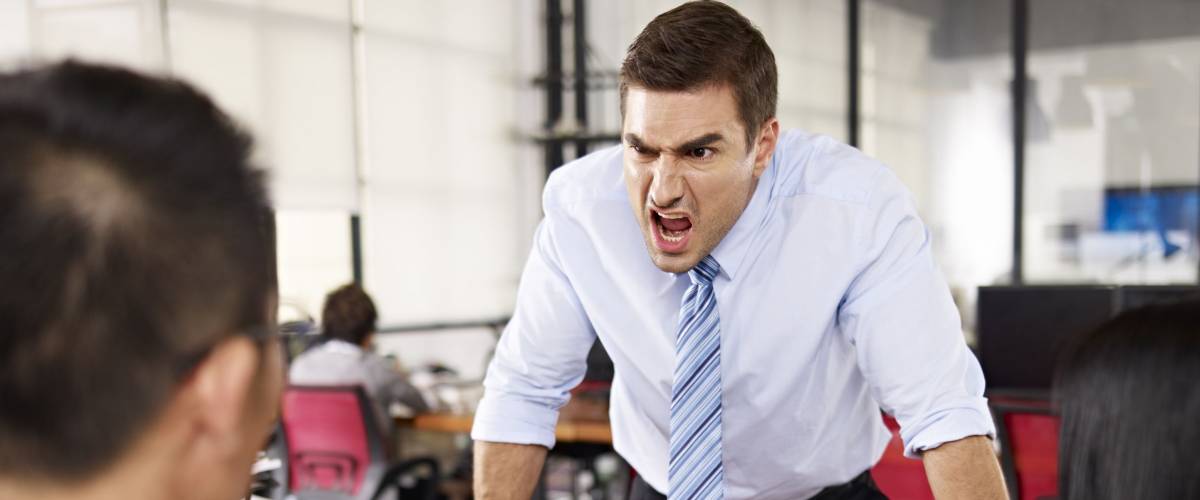 employee in businesswear yelling at subordinate
