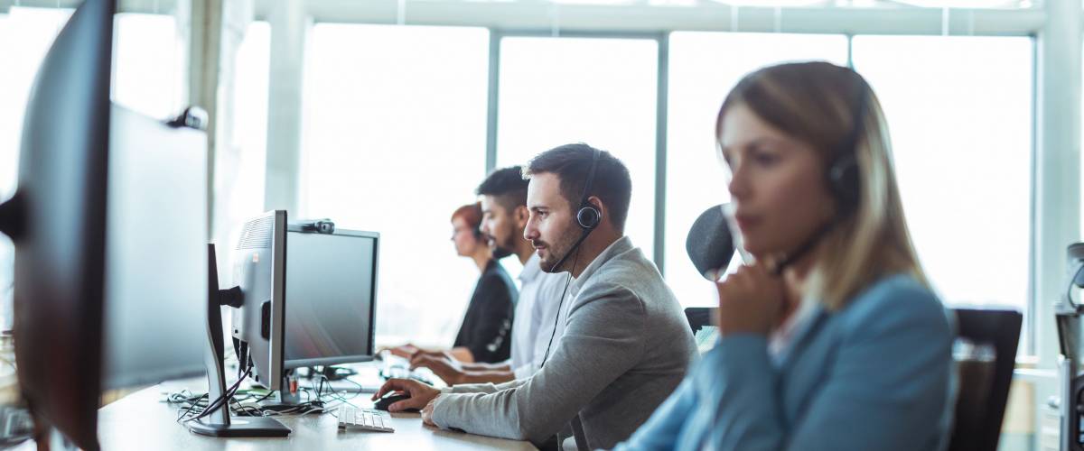 Colleagues working in a call center.