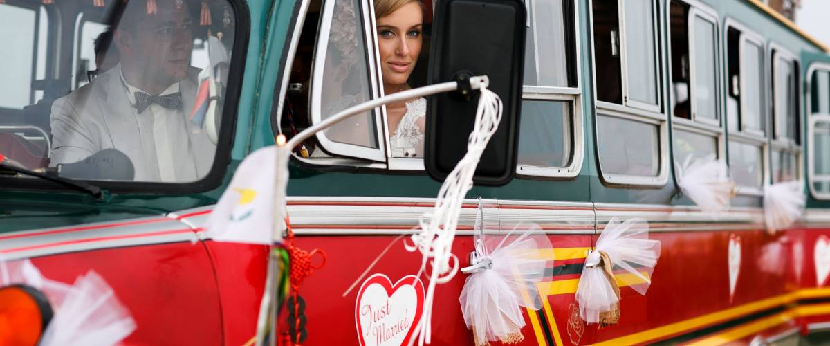 bride in a wedding bus