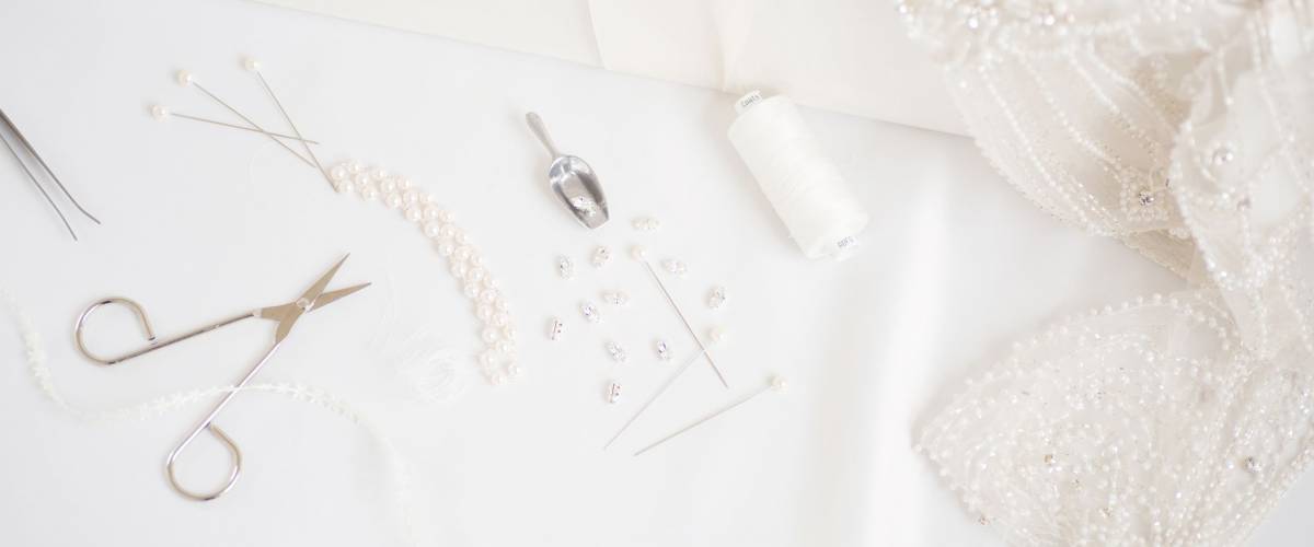 Dressmaking jewels and tools. Clothing alteration shop.