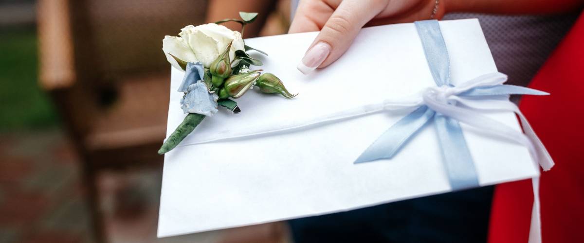 Woman holding an invitation