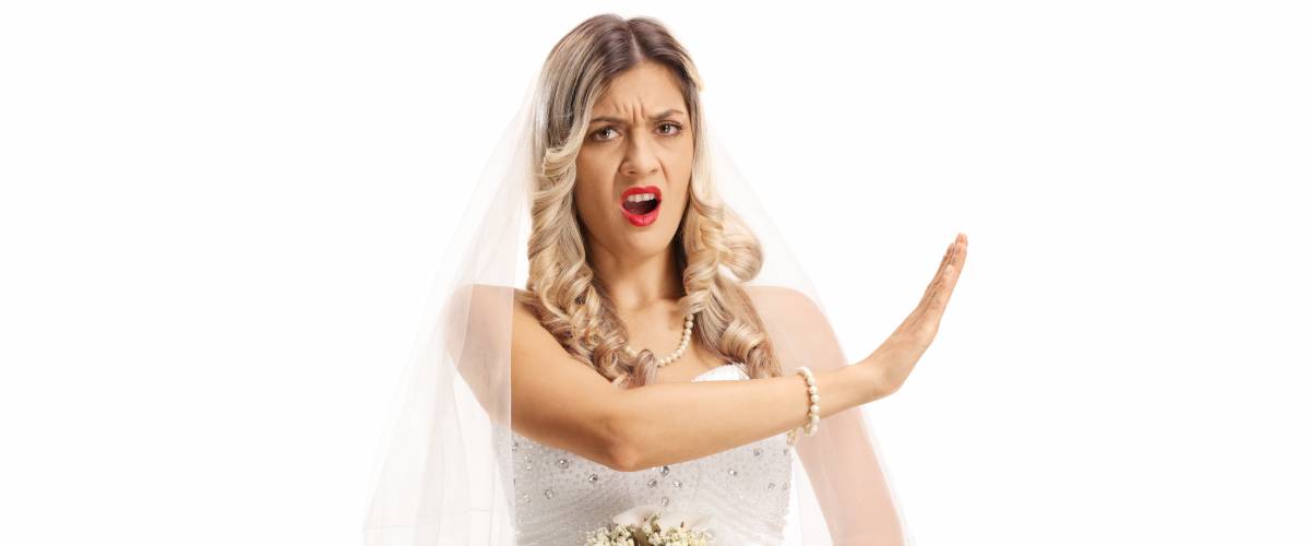 bride making talk to the hand gesture