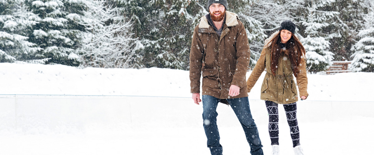 Young couple ice skating